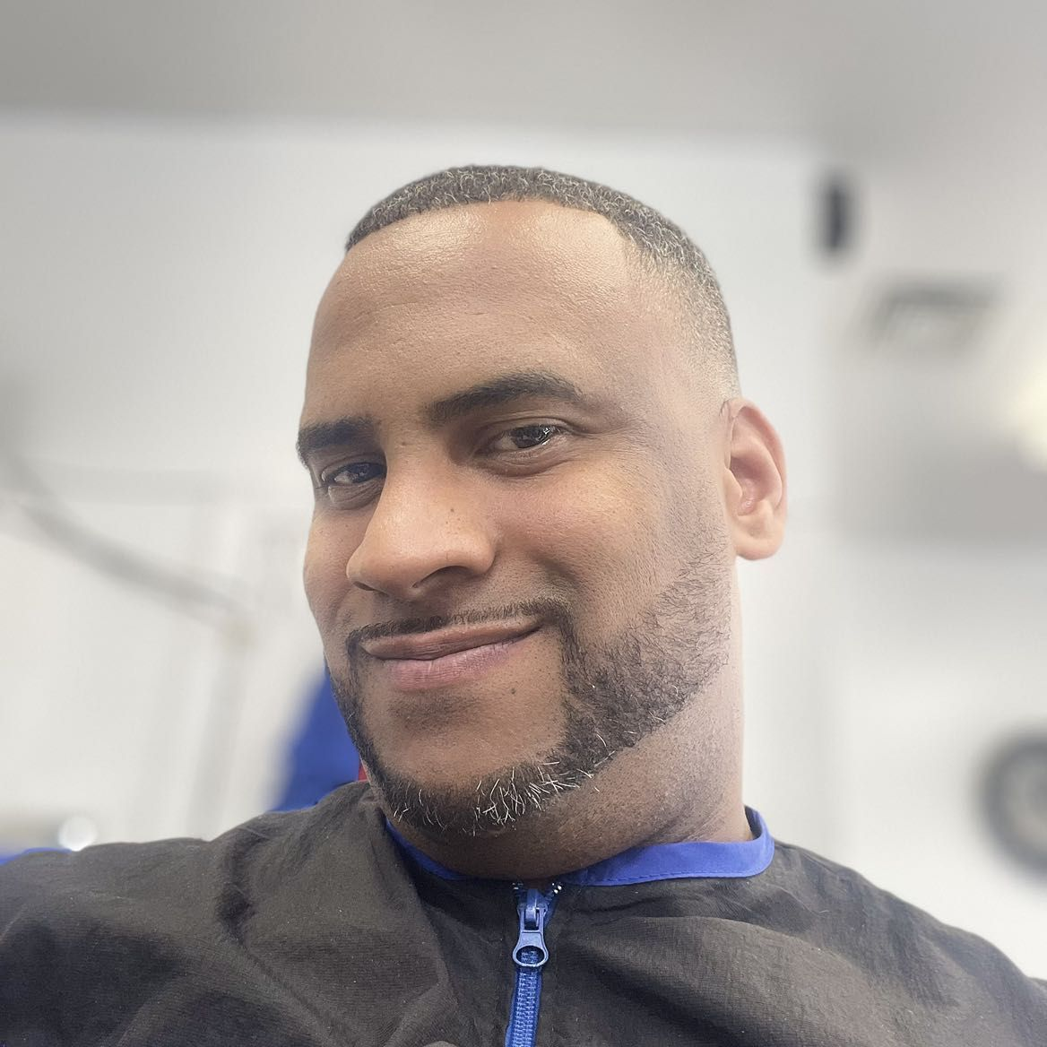 Adult Fearless Cutz client showing detailed beard work